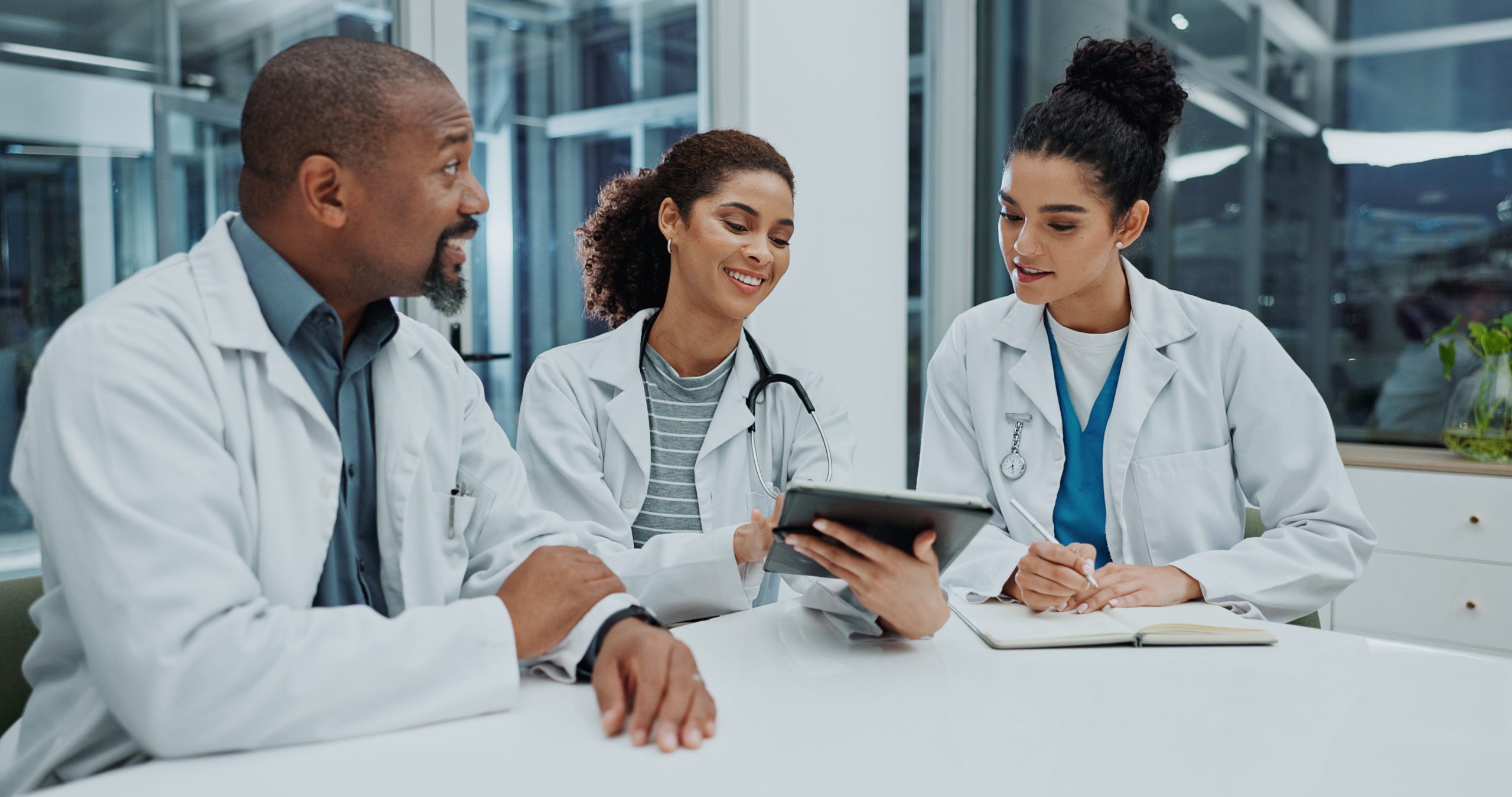 people-doctor-and-team-with-tablet-in-meeting-for-2026-03-25-03-17-22-utc (1)
